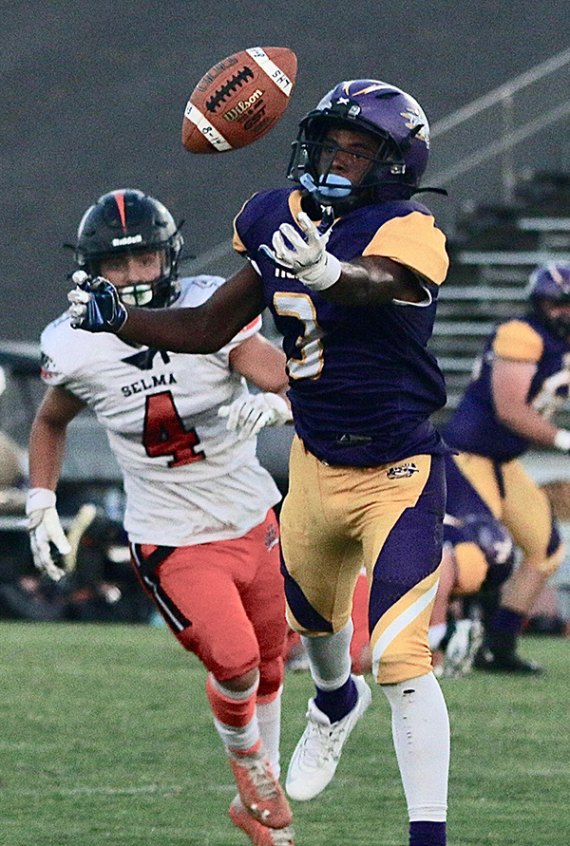 Lemoore's Kobe Green reaches for a pass in the first quarter as the Tigers crushed visiting Selma 48-0 Friday night in Tiger Stadium.